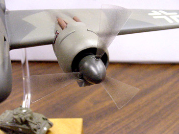 [The simulated spinning props were cut from acetate circles, and black paint was 