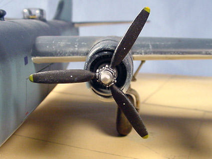 [The kit-supplied props were poor and were replaced from an old Revell B-24D kit.]